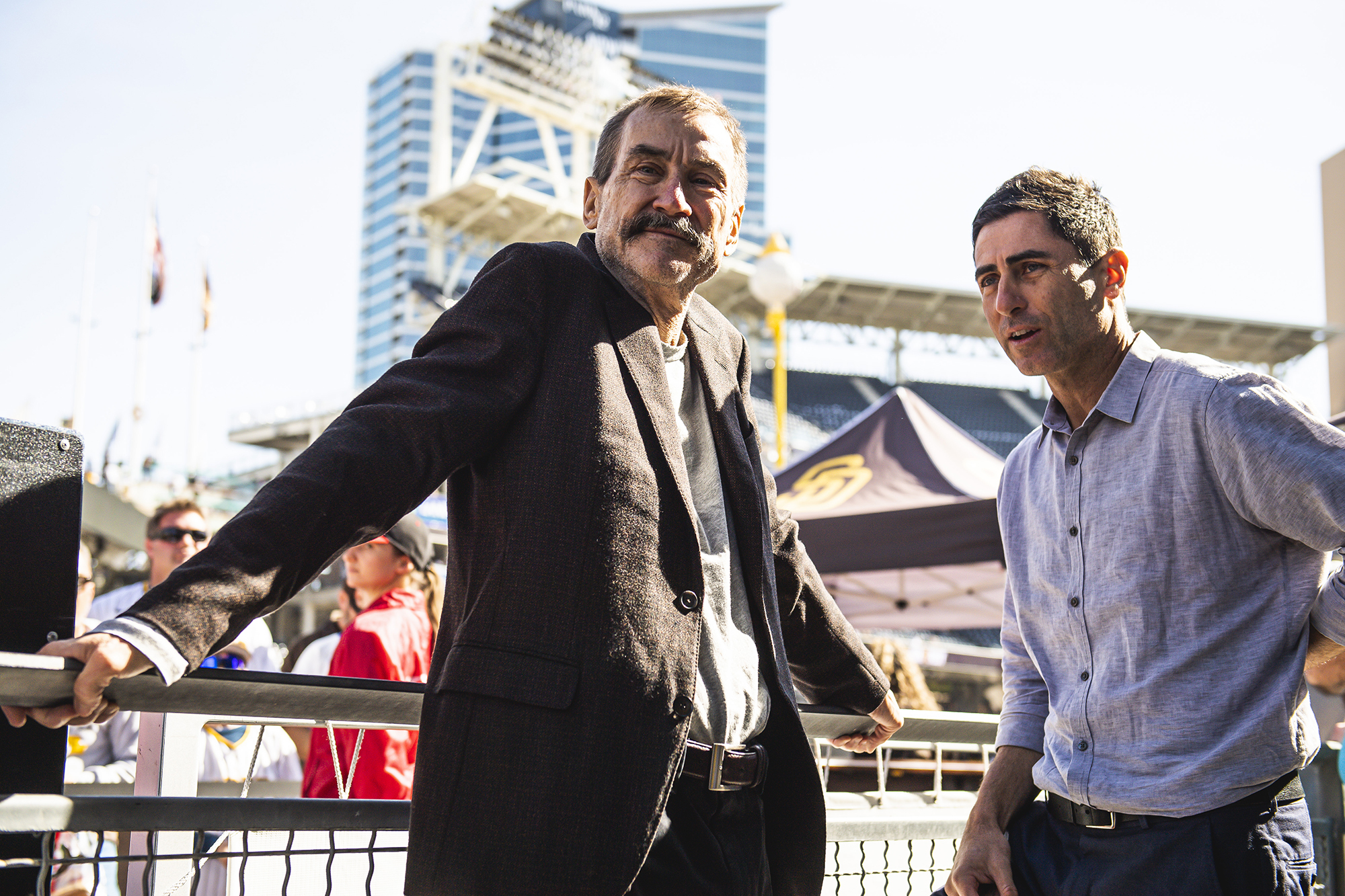 Padres owner Peter Siedler chats with his GM A.J. Preller.